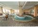 Relaxing pool area with a unique lazy river feature and plenty of lounge chairs at 1321 S Ocean Blvd. # 905, North Myrtle Beach, SC 29582