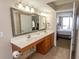 Double vanity bathroom with access to bedroom at 1321 S Ocean Blvd. # 905, North Myrtle Beach, SC 29582
