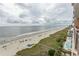 Aerial view showcasing the expansive beach, ocean, and surrounding landscape at 1321 S Ocean Blvd. # 905, North Myrtle Beach, SC 29582