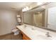 Double vanity bathroom with large mirror at 1321 S Ocean Blvd. # 905, North Myrtle Beach, SC 29582