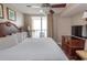 Main bedroom with ocean view and flat screen TV at 1321 S Ocean Blvd. # 905, North Myrtle Beach, SC 29582