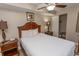 Bedroom with a queen bed, ceiling fan, and closet at 1321 S Ocean Blvd. # 905, North Myrtle Beach, SC 29582