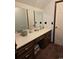 Updated bathroom with granite countertop and dark wood cabinets at 710 Lakeside Dr., Surfside Beach, SC 29575