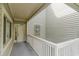 Condo building exterior showing private entrance with white railing at 1551 Spinnaker Dr. # 5822, North Myrtle Beach, SC 29582