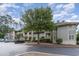 Exterior of a building with parking lot and landscaping at 1551 Spinnaker Dr. # 5822, North Myrtle Beach, SC 29582