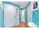 Light blue walls and wood flooring in the entryway at 1551 Spinnaker Dr. # 5822, North Myrtle Beach, SC 29582