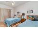Two twin beds, ceiling fan, and wood flooring in bedroom at 1551 Spinnaker Dr. # 5822, North Myrtle Beach, SC 29582