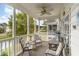 Relaxing screened porch overlooking a tranquil pond at 5056 Glenbrook Dr. # 202, Myrtle Beach, SC 29579