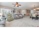 Spacious living area with neutral carpeting and comfy seating at 5056 Glenbrook Dr. # 202, Myrtle Beach, SC 29579