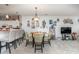Dining area with table, chairs, and coastal-themed wall art at 5056 Glenbrook Dr. # 202, Myrtle Beach, SC 29579