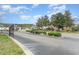 Gated community entrance with lush landscaping at 5056 Glenbrook Dr. # 202, Myrtle Beach, SC 29579