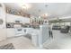 Spacious kitchen with white cabinets, granite countertops, and open floor plan at 5056 Glenbrook Dr. # 202, Myrtle Beach, SC 29579