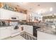 Kitchen with white cabinets, granite countertops, and stainless steel appliances at 5056 Glenbrook Dr. # 202, Myrtle Beach, SC 29579