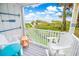 Beachfront balcony with chairs and table at 6302 Ocean Blvd. N # E-1, North Myrtle Beach, SC 29582
