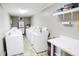 Shared laundry room with multiple washers and dryers at 6302 Ocean Blvd. N # E-1, North Myrtle Beach, SC 29582