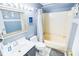 Bathroom with tub, toilet and vanity at 6302 Ocean Blvd. N # E-1, North Myrtle Beach, SC 29582