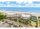 Aerial view of beachfront property with ocean and parking at 6302 Ocean Blvd. N # E-1, North Myrtle Beach, SC 29582