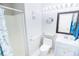 Clean bathroom with shower, toilet and vanity at 6302 Ocean Blvd. N # E-1, North Myrtle Beach, SC 29582