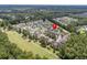 Aerial view of community, showing location of condo building near pool and golf course at 5882 Longwood Dr. # 204, Murrells Inlet, SC 29576