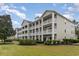Building exterior with landscaping at 1009 World Tour Blvd. # 301, Myrtle Beach, SC 29579