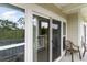 Private balcony with sliding glass doors and seating at 1009 World Tour Blvd. # 301, Myrtle Beach, SC 29579
