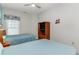 Bedroom with two twin beds and a ceiling fan at 1009 World Tour Blvd. # 301, Myrtle Beach, SC 29579