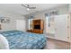 Bedroom with two twin beds, a ceiling fan, and built-in media cabinet at 1009 World Tour Blvd. # 301, Myrtle Beach, SC 29579