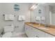 Bathroom with double vanity, granite countertop, and a shower/tub combo at 1009 World Tour Blvd. # 301, Myrtle Beach, SC 29579