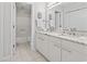 Bathroom with double vanity, granite countertop, and shower/tub combo at 110 Hartland Dr. # 15-E, Myrtle Beach, SC 29572