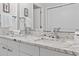 Double vanity bathroom with granite countertop and large mirror at 110 Hartland Dr. # 15-E, Myrtle Beach, SC 29572