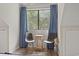 Bedroom sitting area with two chairs and a small table at 110 Hartland Dr. # 15-E, Myrtle Beach, SC 29572