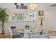 Dining area with a glass-top table, chairs, and view of the kitchen at 110 Hartland Dr. # 15-E, Myrtle Beach, SC 29572