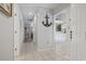 Bright hallway with tile floors, leading to living areas and kitchen at 110 Hartland Dr. # 15-E, Myrtle Beach, SC 29572