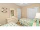 Bedroom with twin beds and coastal decor at 4516 N Plantation Harbour Dr. # H-12, Little River, SC 29566