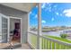 Relaxing screened porch overlooking waterfront with seating and water views at 4516 N Plantation Harbour Dr. # H-12, Little River, SC 29566