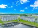 Aerial view of two buildings situated by the water at 4516 N Plantation Harbour Dr. # H-12, Little River, SC 29566