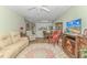 Bright and airy living room with comfortable seating and a fireplace at 4516 N Plantation Harbour Dr. # H-12, Little River, SC 29566