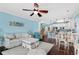 Open living room with comfy seating and ocean view at 117B Ocean Blvd. S, Surfside Beach, SC 29575
