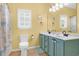 Bathroom with double vanity, light walls, and a shower/tub combo at 117B Ocean Blvd. S, Surfside Beach, SC 29575