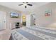 Bedroom with a desk, en-suite bathroom access, and coastal decor at 117B Ocean Blvd. S, Surfside Beach, SC 29575