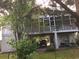 Two-story home with screened porch and carport at 334 Norris Dr., Pawleys Island, SC 29585