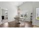 Charming dining area with a round table and view to backyard at 1120 Hickory Knob Ct., Myrtle Beach, SC 29579
