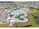 Community pool with lazy river and multiple lounging areas at 1120 Hickory Knob Ct., Myrtle Beach, SC 29579