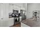 Modern kitchen with stainless steel appliances and granite countertops at 1120 Hickory Knob Ct., Myrtle Beach, SC 29579