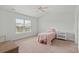 Bright bedroom with carpeted floor, a twin bed, and a window with blinds at 1120 Hickory Knob Ct., Myrtle Beach, SC 29579