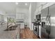 Spacious kitchen boasts stainless steel appliances and granite island at 1120 Hickory Knob Ct., Myrtle Beach, SC 29579