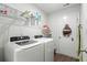 Convenient laundry room with washer, dryer, and ample storage at 1120 Hickory Knob Ct., Myrtle Beach, SC 29579