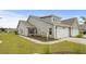 Gray siding two-car garage with landscaping at 1120 Hickory Knob Ct., Myrtle Beach, SC 29579