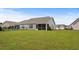 Large backyard with a screened porch and great landscaping at 1120 Hickory Knob Ct., Myrtle Beach, SC 29579