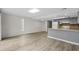 Kitchen with gray cabinets and wood-look floors at 500 Deer Creek Rd. # D, Surfside Beach, SC 29575